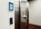 Show photo 6: Paznic screen and fingerprint reader mounted next to the vault door handle