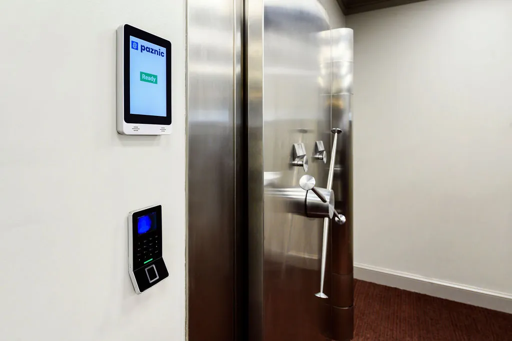 Paznic screen and fingerprint reader mounted next to the vault door handle