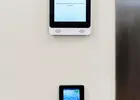 Show photo 11: Paznic touch screen showing an Unauthorized message above the fingerprint reader