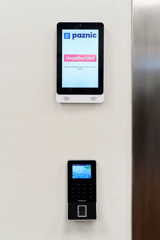 Paznic touch screen showing an Unauthorized message above the fingerprint reader