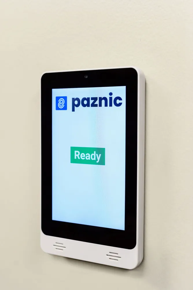 Paznic touch screen displaying the Ready state on a branch wall