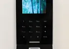 Show photo 17: Close-up of the Paznic biometric keypad and fingerprint sensor